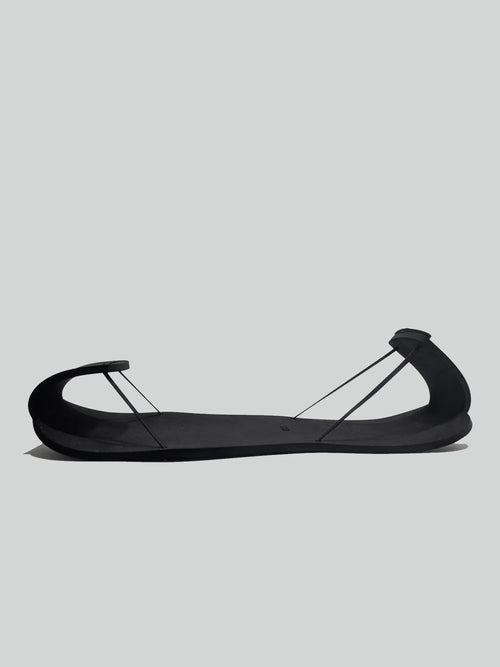 paire de patinoufles noire à petit prix